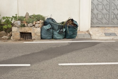 Workers sorting construction debris for recycling
